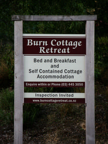 Burn Cottage Retreat sign at entrance gate